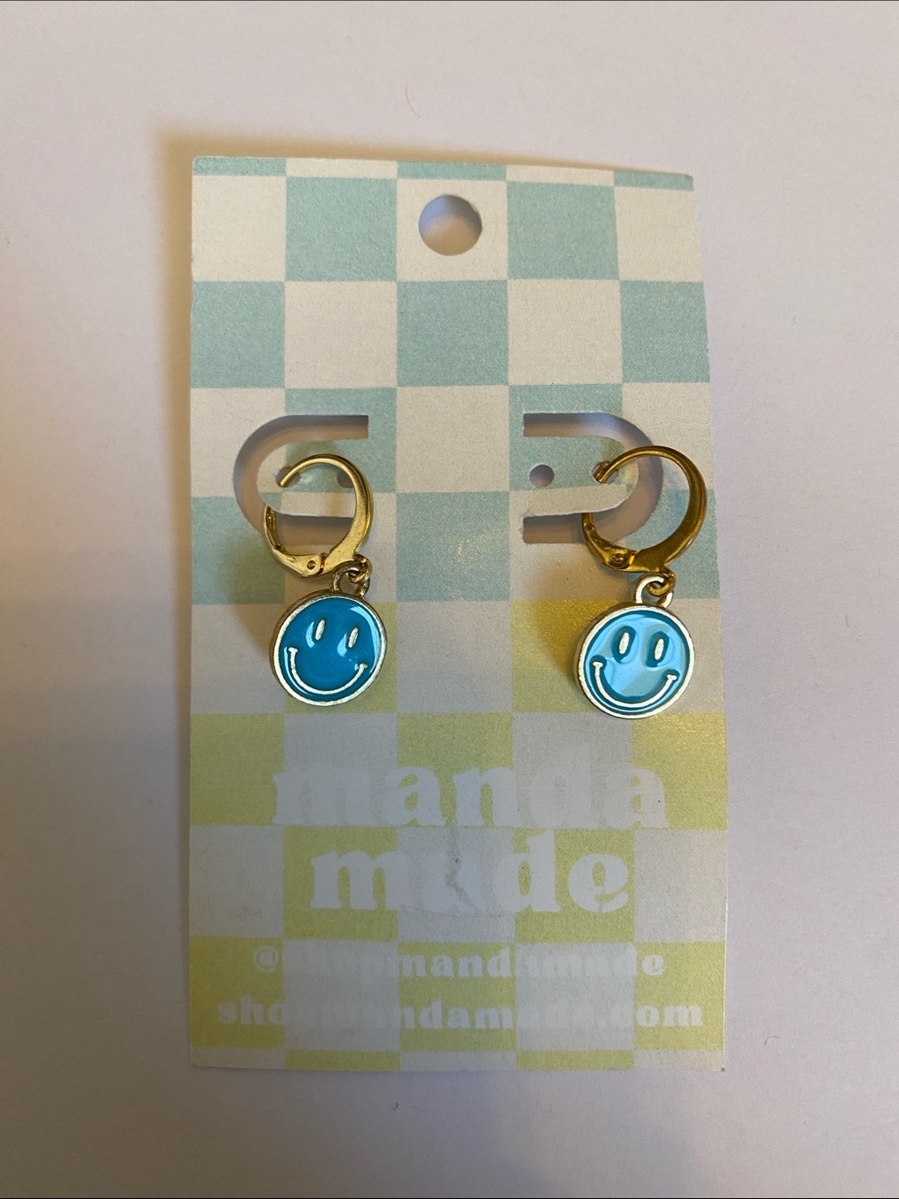 Gold Hoop Earrings with Blue Smiley Face Charms